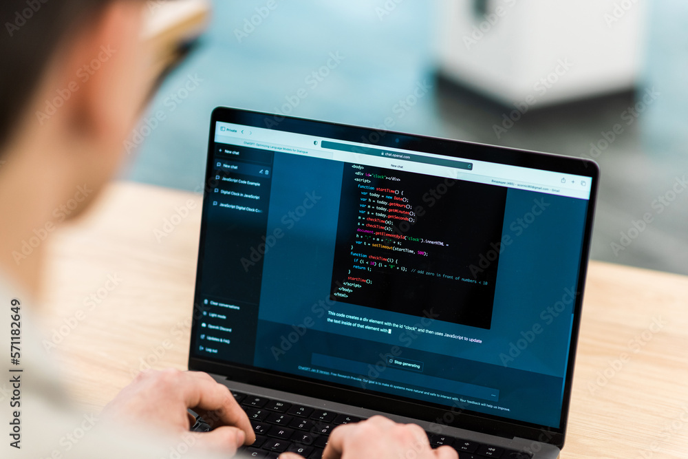Close view of a software developer generating code in an AI chat by giving a request Close view of a software developer generating code in an AI chat by giving a request