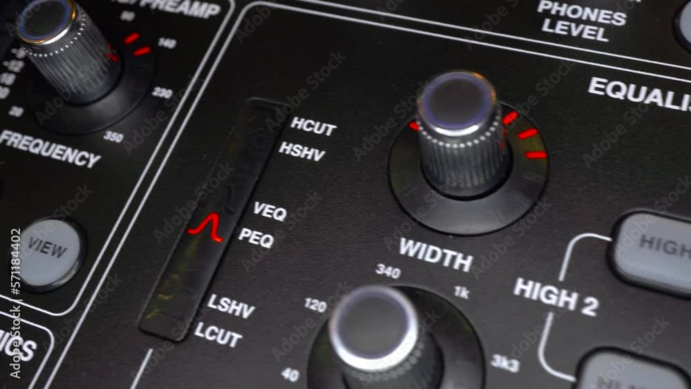 Electronic audio mixer close-up. Sound control panel. Panel with macro settings. The camera makes a slide. Electronic audio mixer close-up. Sound control panel. Panel with macro settings. The camera makes a slide.