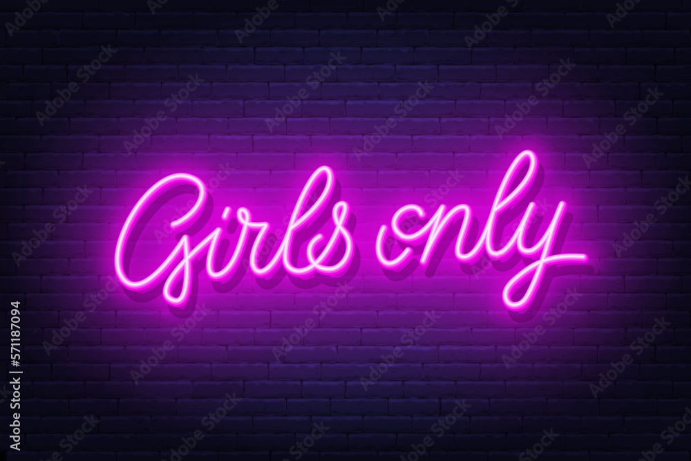 Girls Only neon sign on brick wall background.