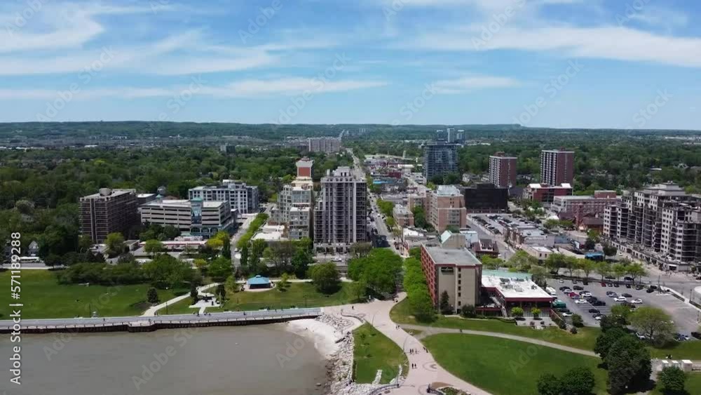 Drone flying from lake to downtown Burlington in summer. Drone flying from lake to downtown Burlington in summer.