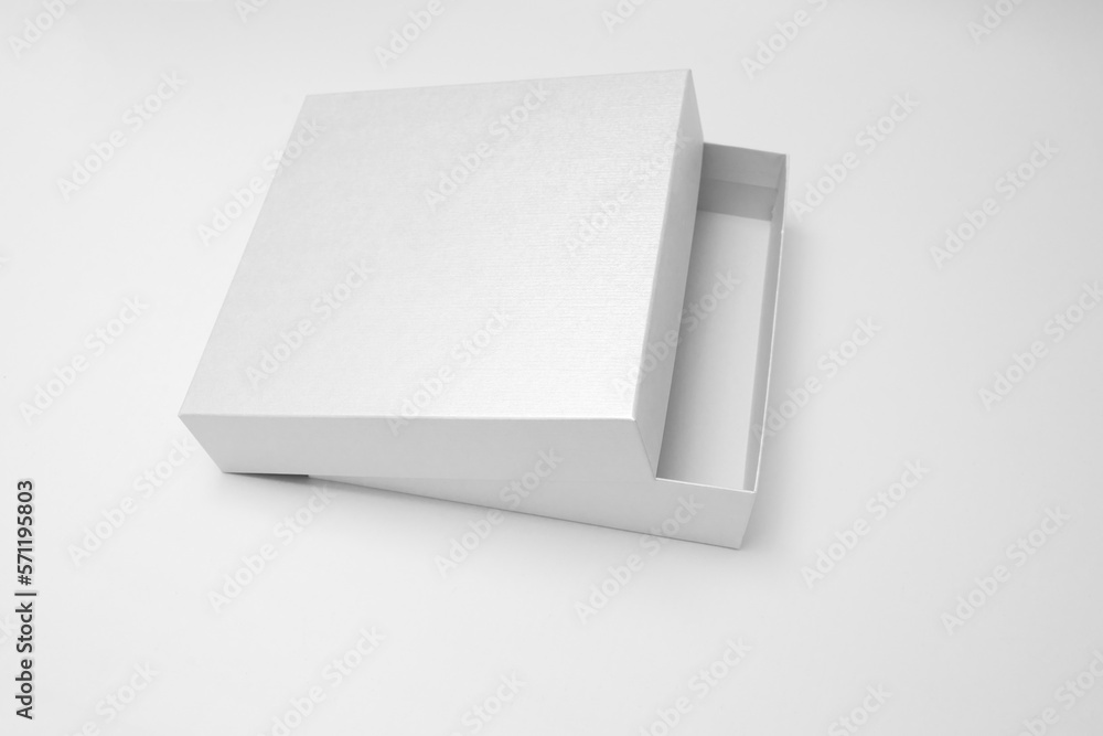 White textured opened box, gift mockup on white background.High resolution photo. Blank White Product Package Box Mock-up. Container, Packaging Template on white. Cardboard box. White textured opened box, gift mockup on white background.High resolution photo. Blank White Product Package Box Mock-up. Container, Packaging Template on white. Cardboard box.