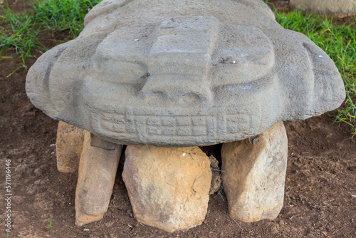 San Agustin (San Agustín), Huila, Colombia : close-up of a pre-columbian megalithic sculpture on display in the archaeological park. Impressive funeral megalithic statue carved with volcanic stone. photo