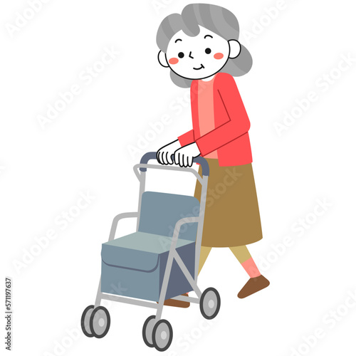シルバーカーを押して歩くシニア女性