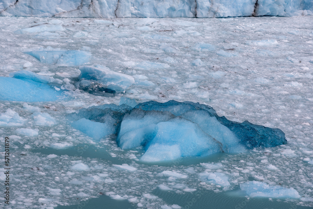 Fototapeta premium Deep blue and white chunks of ice of the famous glacier and natural sight Perito in the turquoise water of Lago Argentino in Patagonia, Argentina, South America 