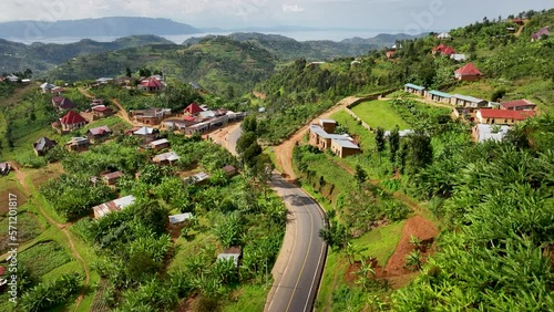 High drone shot of mountain side two lane road in Rwanda. photo