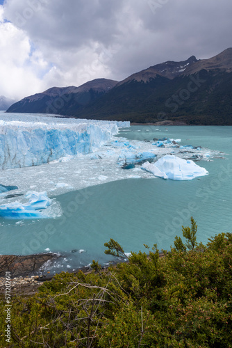 The famous glacier and natural sight Perito Moreno with the icy waters of Lago Argentino in Patagonia, Argentina, South America  © freedom_wanted
