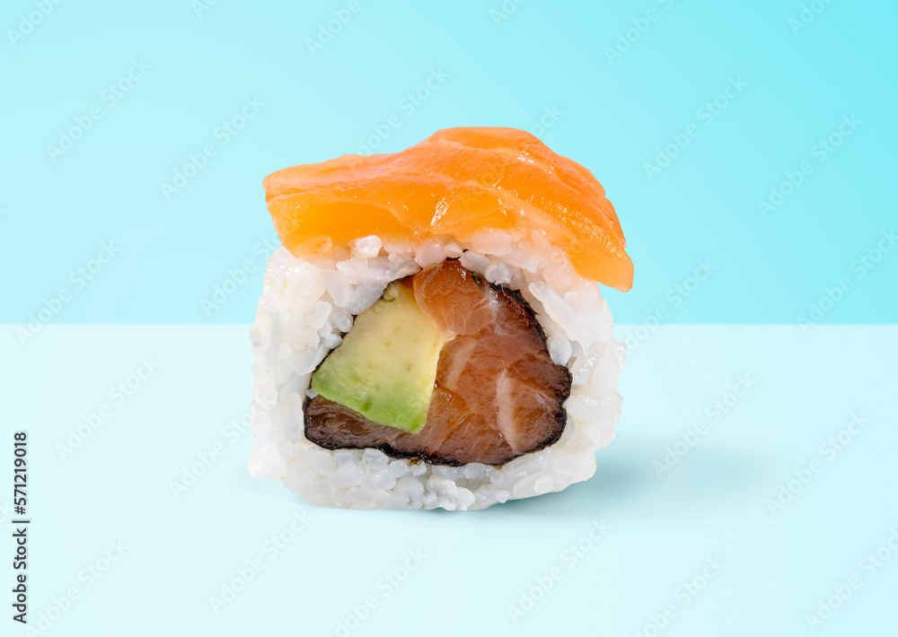 traditional japanese cuisine, japanese sushi, maki sushi with salmon on a blue background