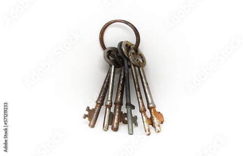 A bunch of rusty antique keys on a ring