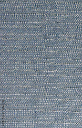 Cotton textile gray material close-up abstract defocused background.
