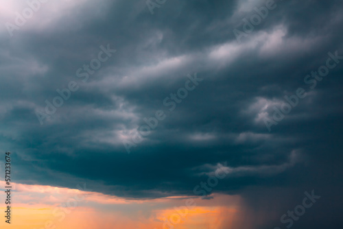 Dark clouds with heavy rain . Hurricane clouds in twilight © russieseo