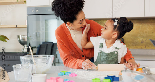 Cooking, learning and mother and girl in kitchen for food, health and breakfast at morning. Help, wellness and happy with mom and child at table in family home for baking, cake and dessert lifestyle