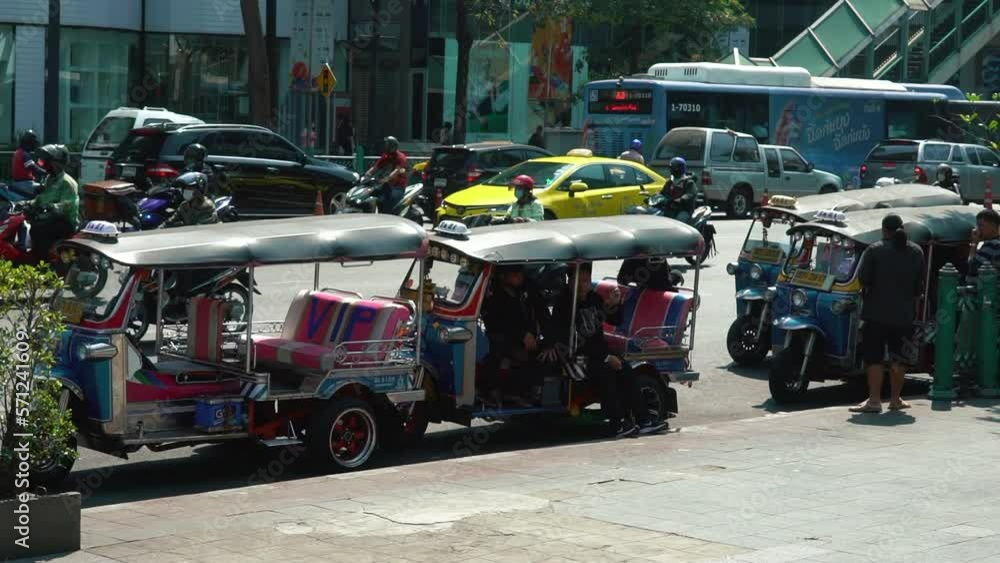 Fastest Rickshaw BANGKOK, THAILAND. 29.01.2023. Traditional Tuk Tuk in the street. Auto ...