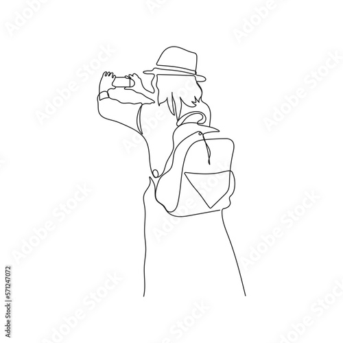 Travel girl with backpack making photo with smartphone. One line art. Tourism concept. Hand drawn vector illustration.