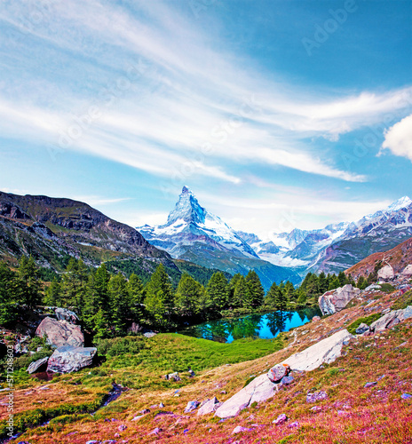 Obraz na płótnie Magical beautiful autumn landscape with fir trees near lake on background Matterhorn in the Swiss Alps, near Zermatt, Switzerland. Amazing places. (Meditation, antistress - concept). w salonie