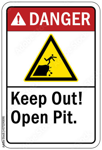 Open trench and pit sign and labels keep out, open pit