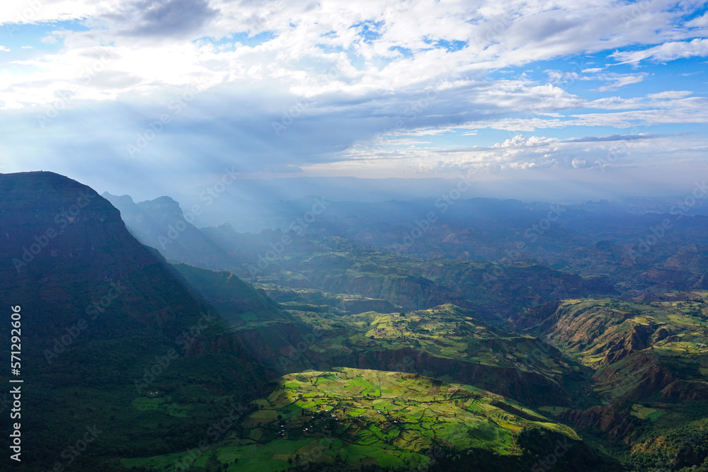 Panoramic view of valley landscape in the Simien Mountains Ethiopia, Africa with sunrays shining through the clouds