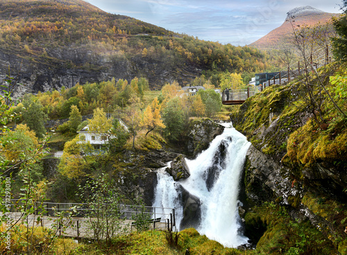 waterfall at geiranger fjord in autumn photo