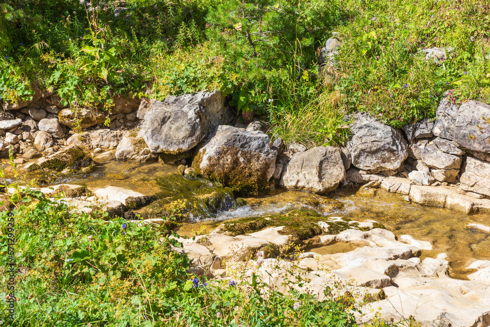 Summer, river, mountainous terrain, tourist routes running through the park, a place for walking and recreation. Summer, river, mountainous terrain, tourist routes running through the park, a place for walking and recreation.