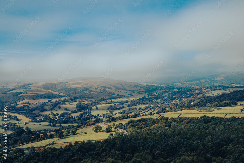 clouds over the Peak District hills