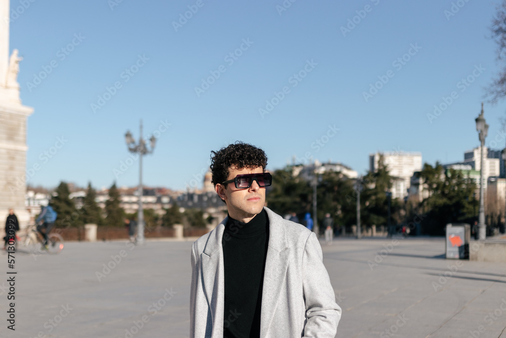 Young man walking in the city
