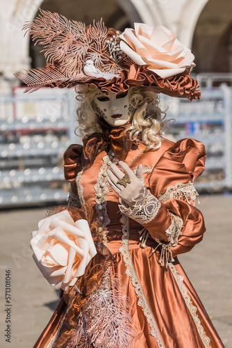 People wearing elaborate and colorful costumes and masks during the Venice 2023 carnival in Venice, Italy © gammaphotostudio