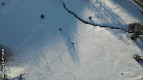 Aerial view of people on Ischia Plateau with snow in wintertime on Mount Terminio, Serino, Avellino, Irpinia, Campania, Italy. photo