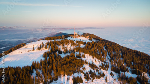 Aerial view of the mountain plateau of the Schöckl mountain near Graz on a beautiful winter evening