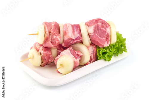 Raw pork skewers, ready to cook, BBQ, isolated on white background.