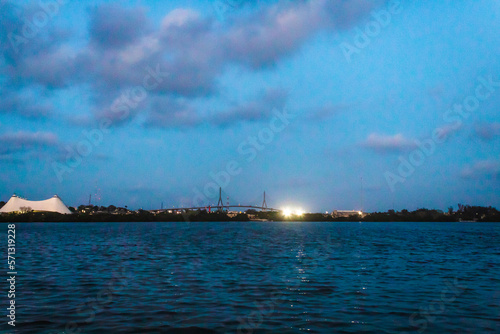 lagoon at evening in blue hour with buildings in the background, carpenter's lagoon in tampico tamaulipas  photo