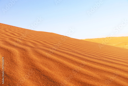 Sand dunes desert Background - Beautiful Arabian desert © Ayman