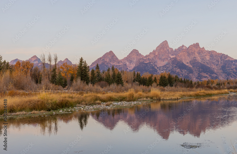 Scenic Autumn Reflection Landscape in the Tetons at Sunrise Scenic Autumn Reflection Landscape in the Tetons at Sunrise