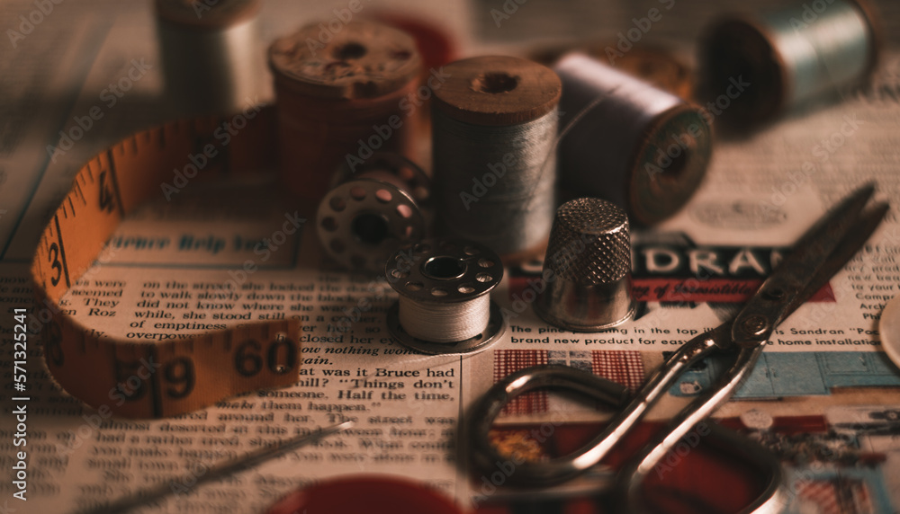 still life shot of thread and antique sewing accessories still life shot of thread and antique sewing accessories