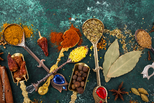 Assortment of diffferent Indian spices and herbs photo