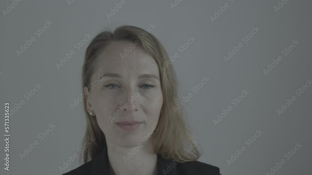 Portrait of a pleasant Caucasian woman who is smiling. Positive emotions. Kind people. Portrait of a pleasant Caucasian woman who is smiling. Positive emotions. Kind people.