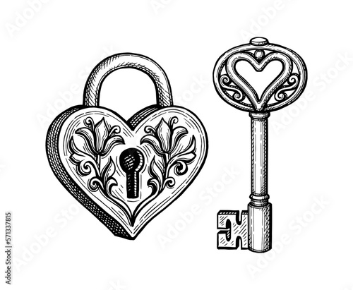 Vintage heart shaped padlock and key.