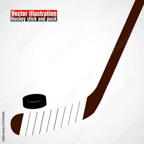 Hockey stick and puck isolated on white background