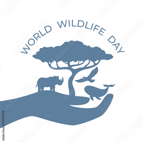 planet earth in the palm of hand. world wildlife day concept