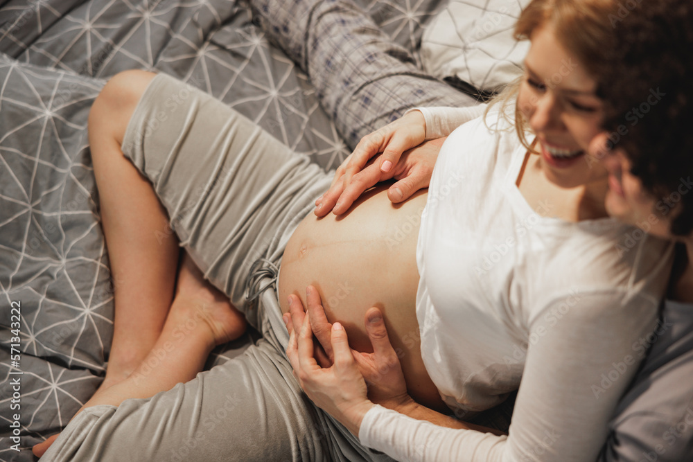 Pregnant Couple Feels Love And Relaxing At Home Pregnant Couple Feels Love And Relaxing At Home
