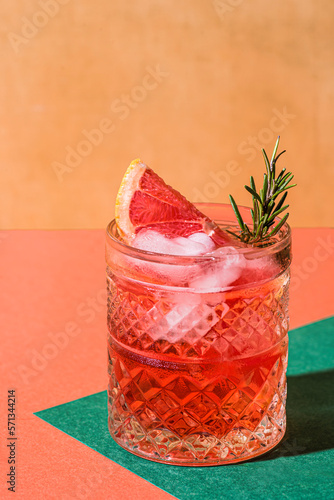 Wallpaper Mural Red cocktail in base of Campari or bitter with blood red oranges (tarocco) on the geometric  background. Aperitif with Americano or Negroni cocktail. Retro chic style, close up Torontodigital.ca