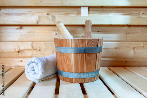 Detail from buckets and white towels in a sauna, wellness accessories