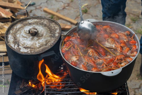 The process of cooking crayfish, a traditional snack for beer. Background, selective focus