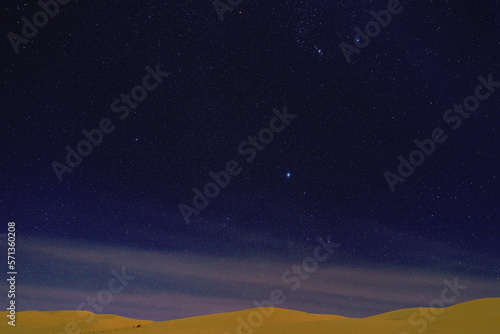STARRY NIGHT AND NIGHT PHOTOGRAPHY DURING JEEP SAFARI IN THE SAHARA DESERT IN ALGERIA