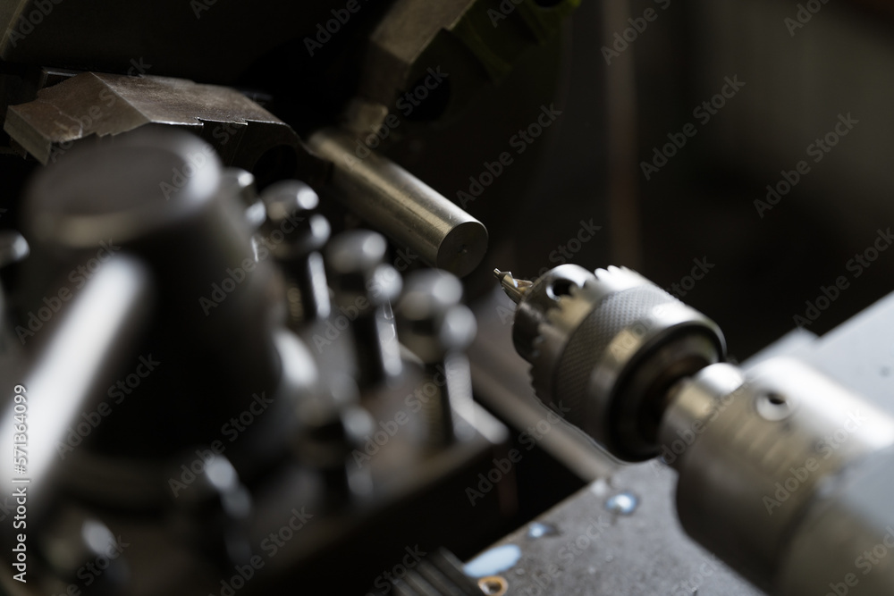 Naklejka premium Center processing with a lathe 