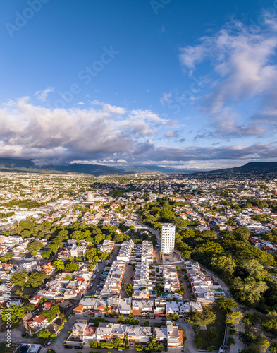 Aerial view of a big mountain at sunset. The beautiful city of Tuxtla Gutierrez in Mexico. Panorama.