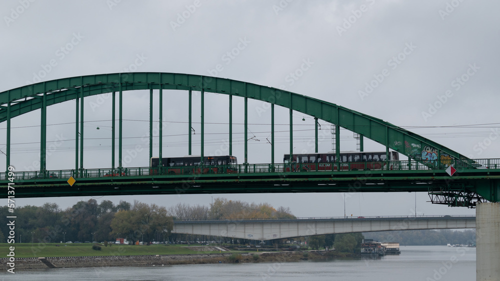 Naklejka premium Old bridge across Sava river in Belgrade, green arch bridge
