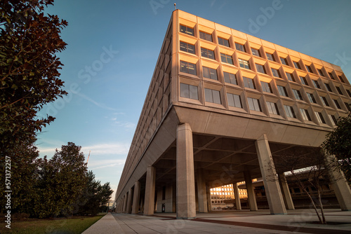 The golden hour light is cast on the James V. Forrestal Building, the headquarters of the United States Department of Energy, in downtown Washington, DC at sunset. photo
