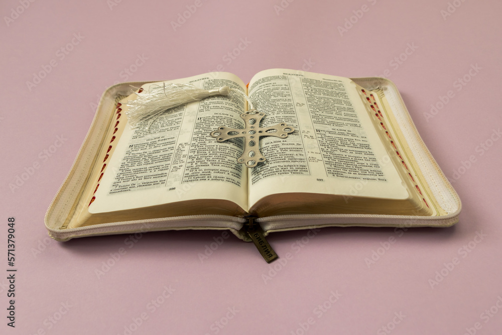 Fototapeta premium open bible in Russian cross