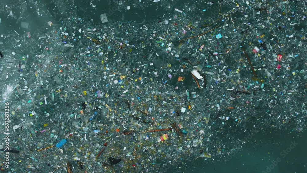 Ocean and plastic trash, aerial view. Pollution by plastic rubbish