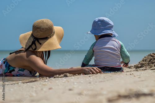 mom and children on the beach