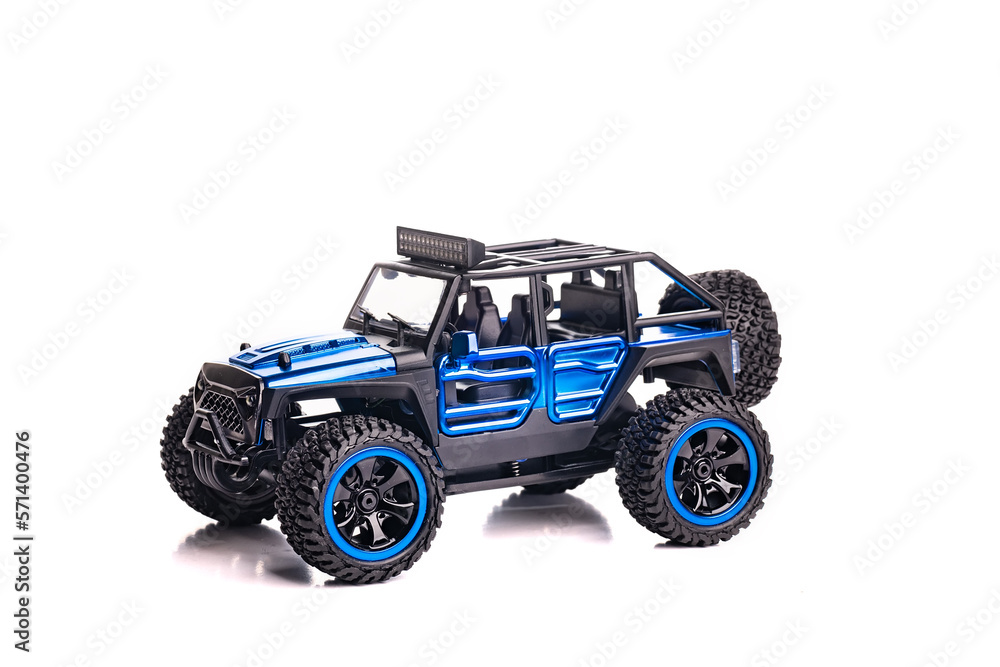 Sport SUV  on white background. Electric car toy.